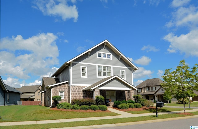 craftsman house with a front yard