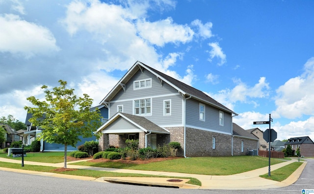 view of front of property with a front yard and central AC unit