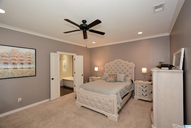 bedroom featuring ceiling fan, crown molding, ensuite bathroom, and light carpet