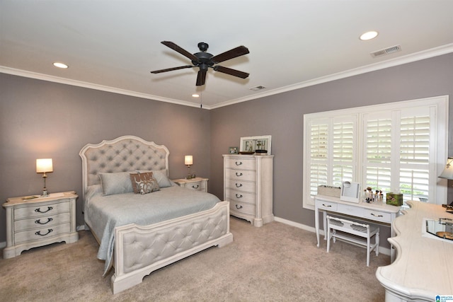 bedroom featuring ornamental molding, ceiling fan, and carpet