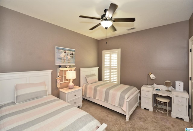 bedroom with light colored carpet and ceiling fan