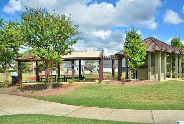 view of community featuring a yard