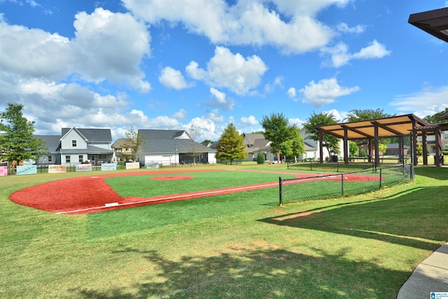 view of home's community with a lawn