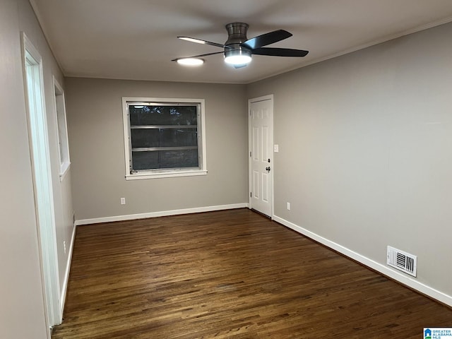 unfurnished room featuring ceiling fan and dark hardwood / wood-style floors