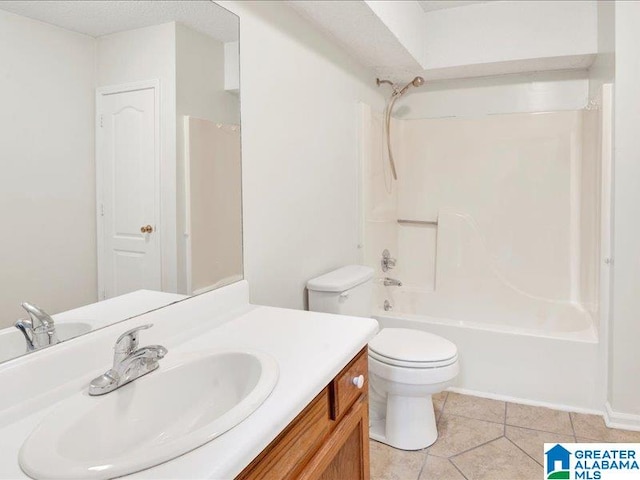 full bathroom with tile patterned floors, vanity, toilet, and  shower combination