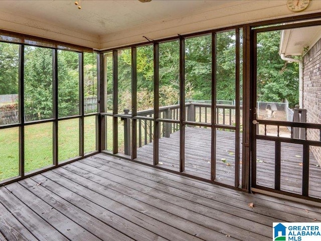 unfurnished sunroom featuring plenty of natural light