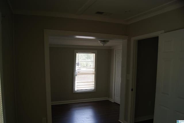 unfurnished room featuring dark wood-type flooring