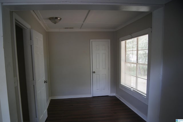 unfurnished room with dark hardwood / wood-style floors