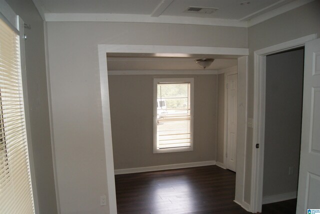 empty room featuring dark wood-type flooring