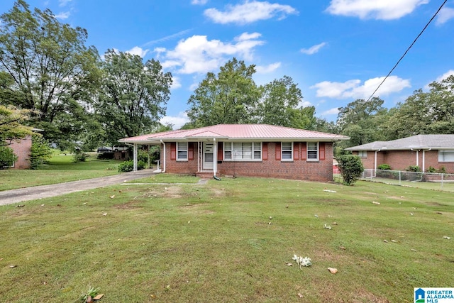 ranch-style home with a front yard