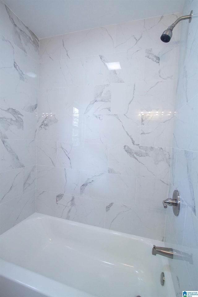 bathroom with shower / bath combination