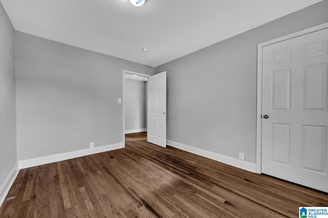 unfurnished bedroom with wood-type flooring