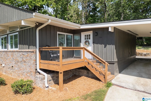 doorway to property with a deck