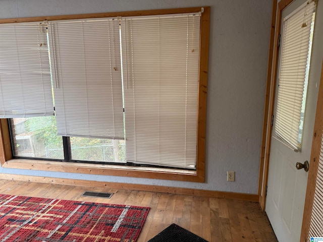 interior details with hardwood / wood-style floors