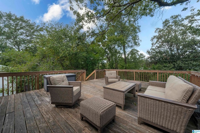 wooden deck with an outdoor hangout area