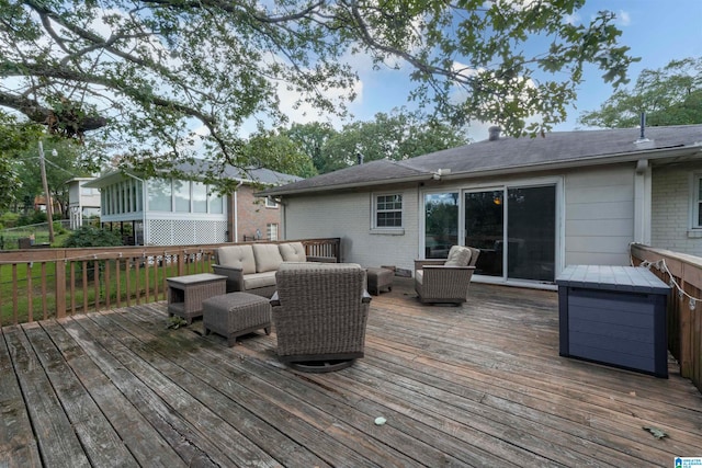 wooden deck with an outdoor hangout area