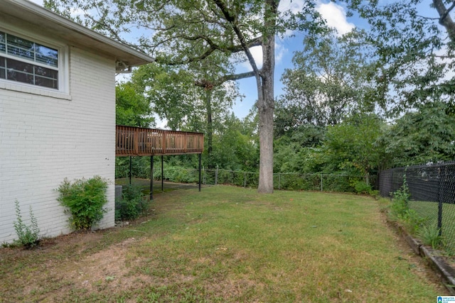 view of yard featuring a deck