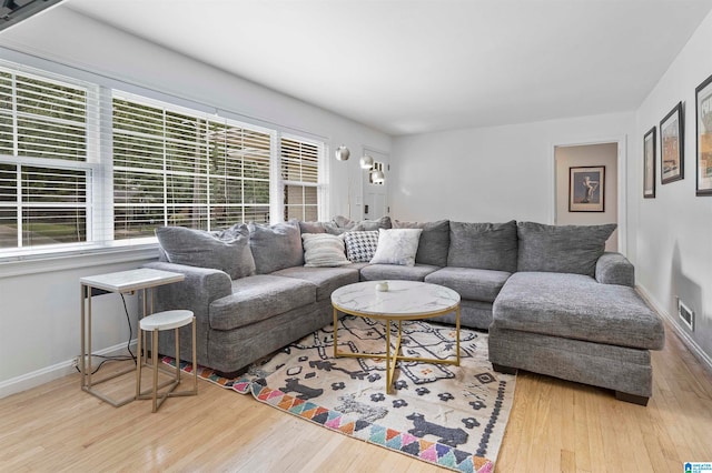 living room with light hardwood / wood-style floors