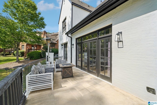 view of patio with a fire pit