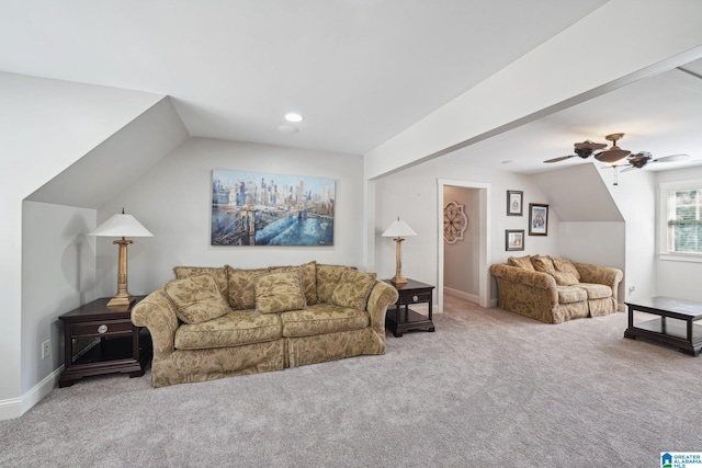 carpeted living room featuring lofted ceiling and ceiling fan