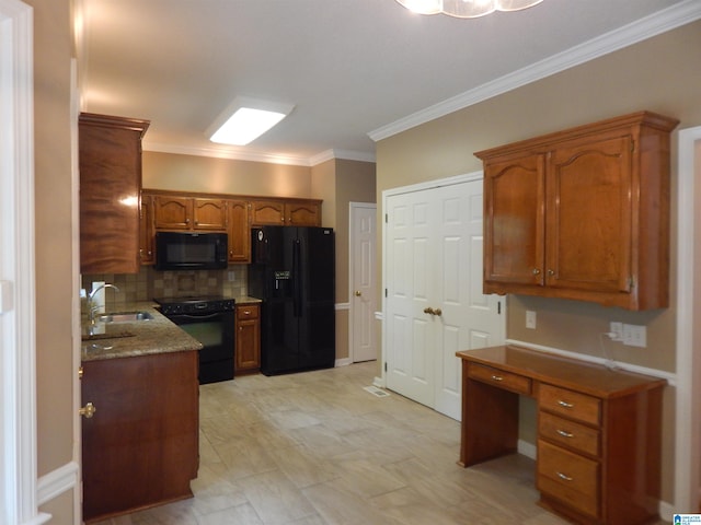 kitchen featuring black appliances, backsplash, ornamental molding, sink, and light stone counters