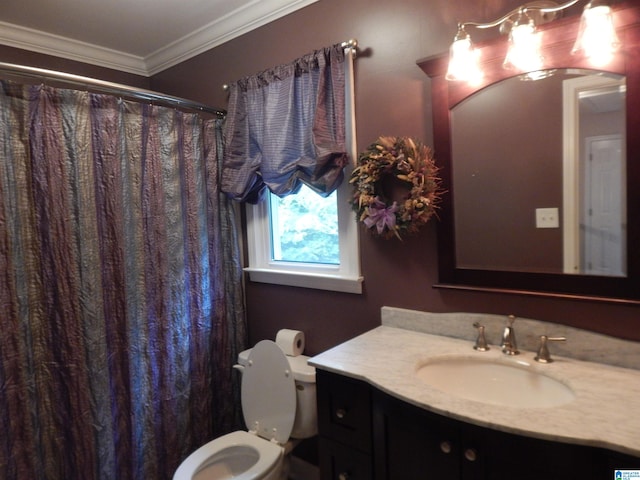 bathroom with a shower with shower curtain, toilet, ornamental molding, and vanity