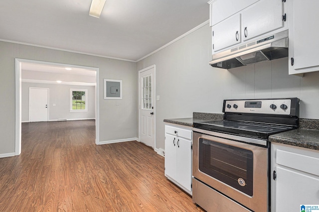 kitchen with crown molding, stainless steel electric range, white cabinets, and light hardwood / wood-style floors