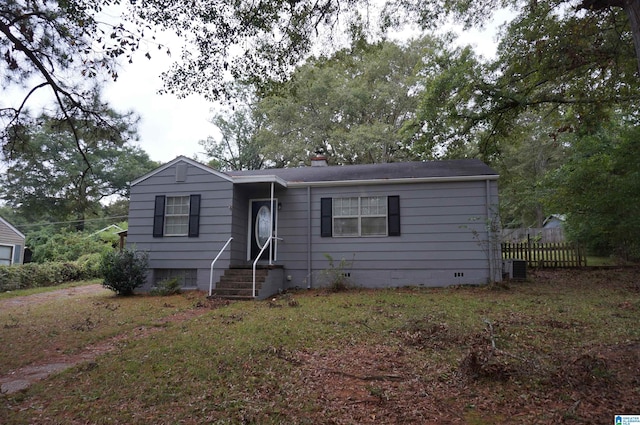 view of front of home with fence and a chimney