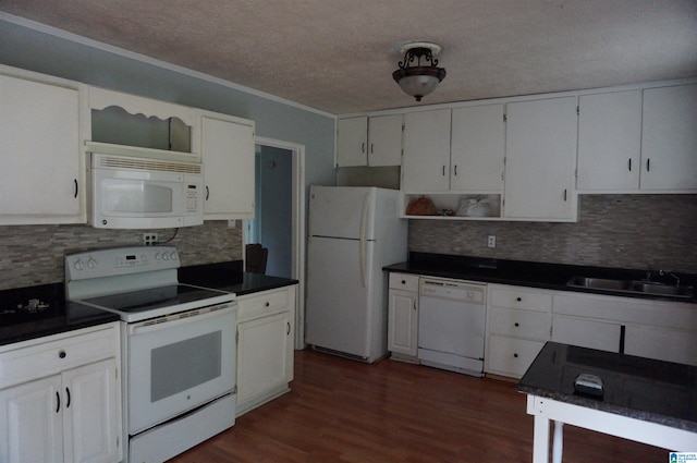 kitchen featuring crown molding, white appliances, sink, dark wood-type flooring, and white cabinets