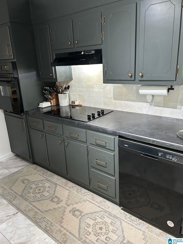 kitchen featuring tasteful backsplash, gray cabinetry, and black appliances