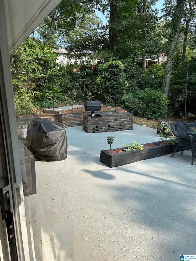 view of patio / terrace with a grill