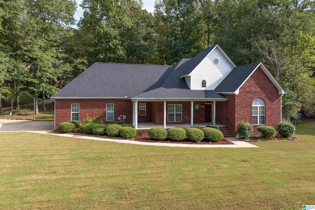 view of front of house with a front lawn and covered porch