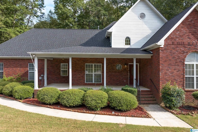 view of front of property featuring covered porch