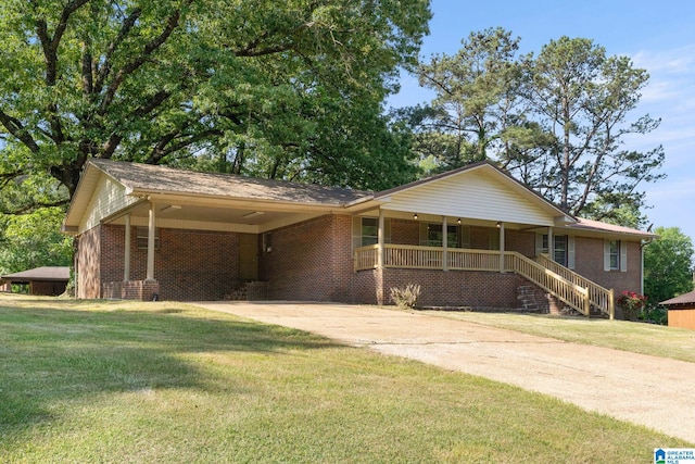ranch-style house with a front yard, brick siding, driveway, a porch, and a carport