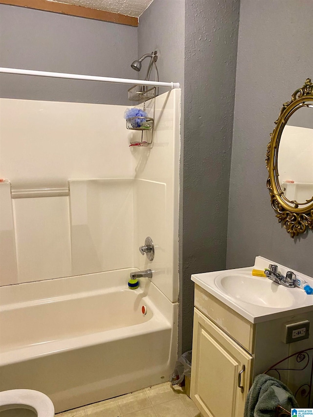 full bathroom with vanity, toilet, tile patterned floors, and  shower combination