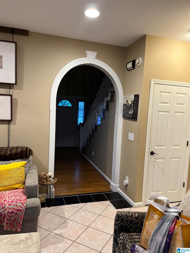 foyer entrance with wood-type flooring