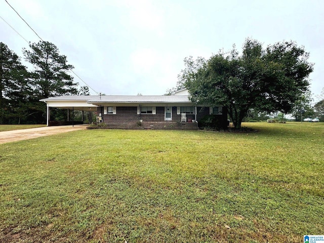 ranch-style house with a front lawn and a carport