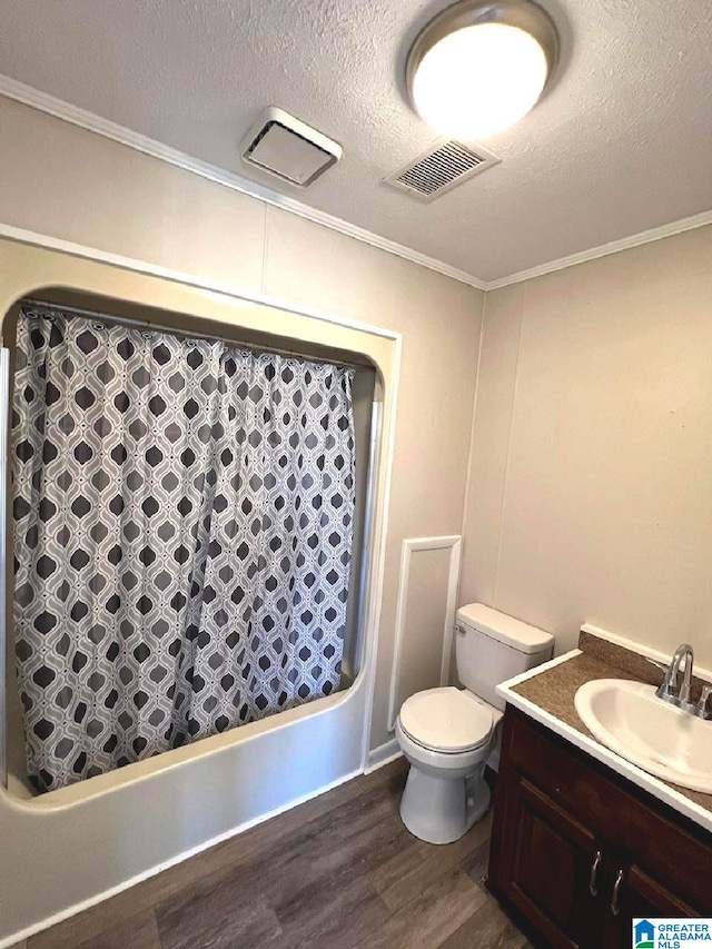 full bathroom featuring vanity, shower / bath combination with curtain, a textured ceiling, wood-type flooring, and toilet