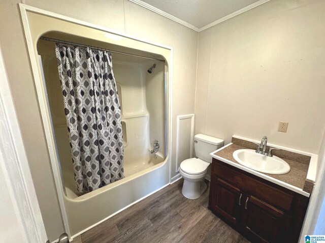 full bathroom with shower / bath combination with curtain, vanity, ornamental molding, hardwood / wood-style flooring, and toilet