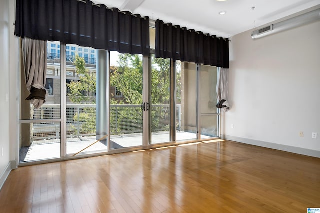 doorway to outside featuring hardwood / wood-style flooring