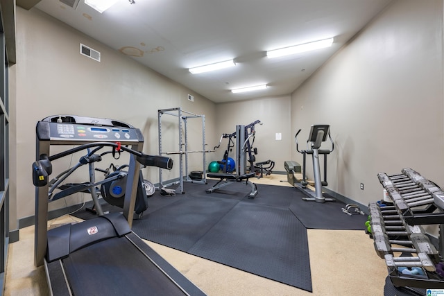 exercise room with carpet floors