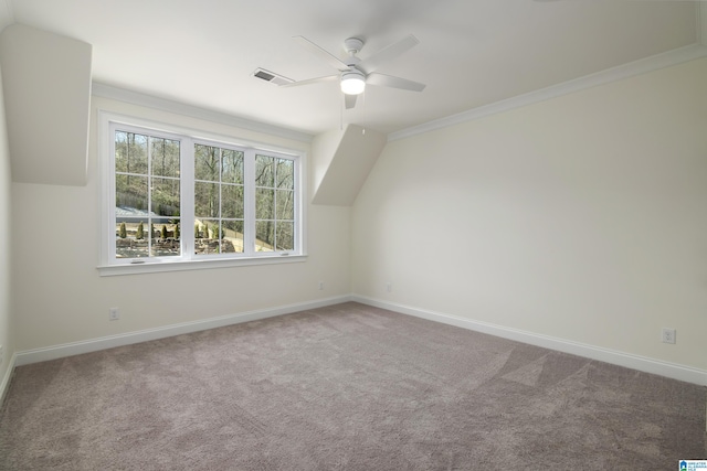 bonus room with visible vents, baseboards, carpet, and a ceiling fan