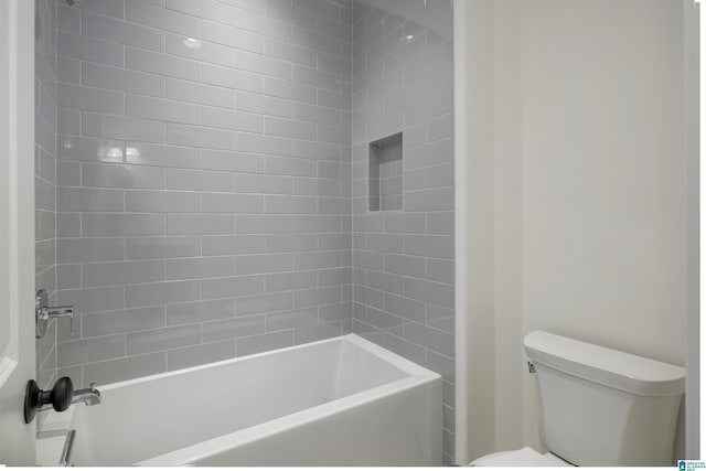 bathroom with toilet and shower / tub combination