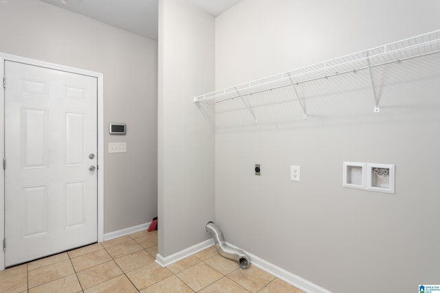 laundry room with washer hookup, light tile patterned floors, and electric dryer hookup