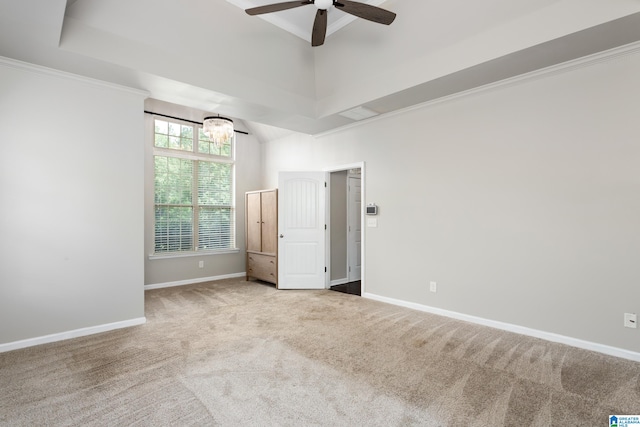 unfurnished bedroom with ceiling fan, light carpet, and ornamental molding