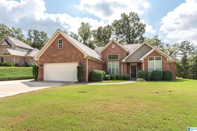 view of front of house featuring a front yard and a garage