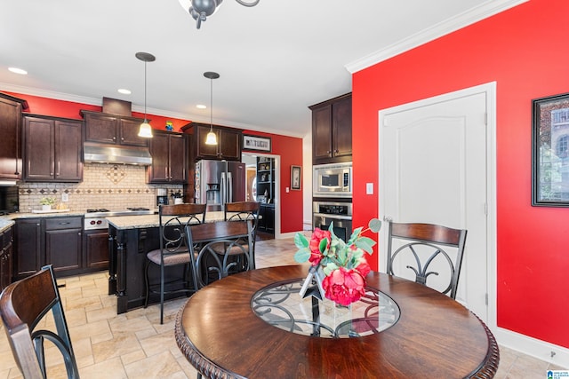 dining room with crown molding