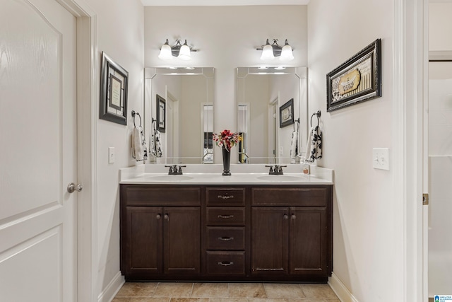 bathroom with vanity and tile patterned flooring