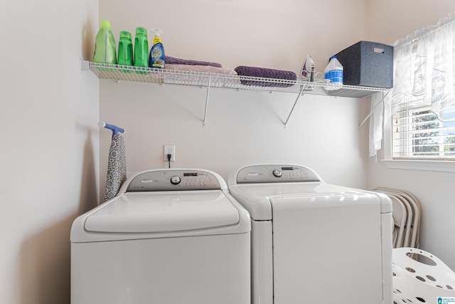 laundry room with separate washer and dryer