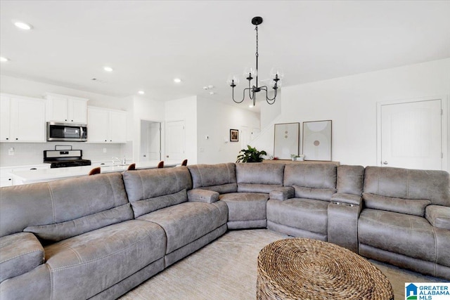 living room with a chandelier